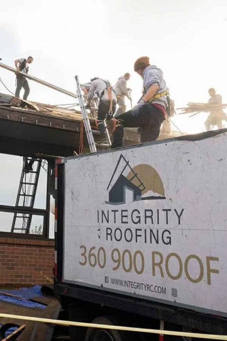 toys for tots with Integrity Roofing Construction